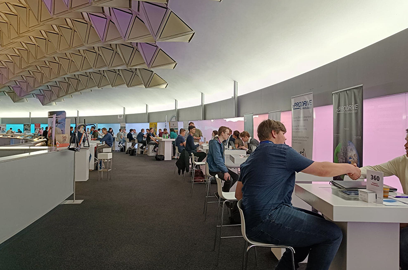 An image of networking tables designed for one-on-one speed networking at a business event.