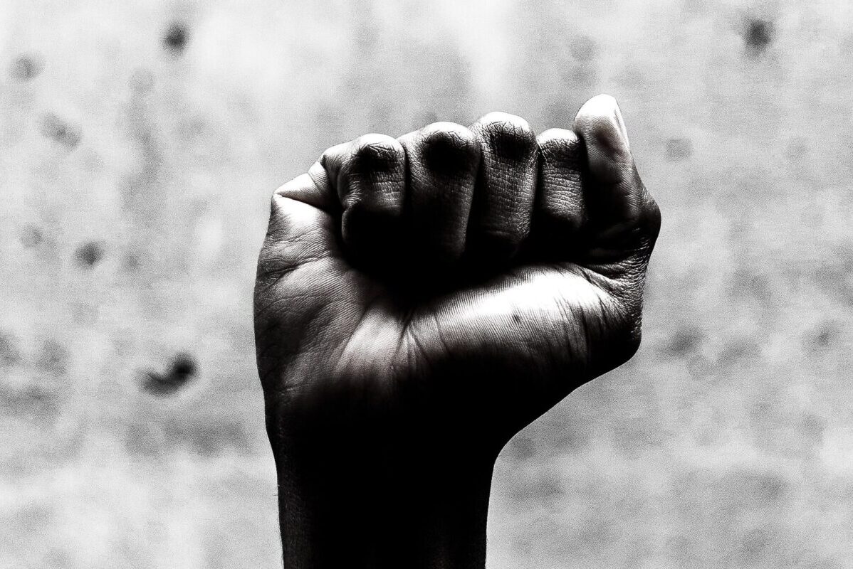 Fist in air