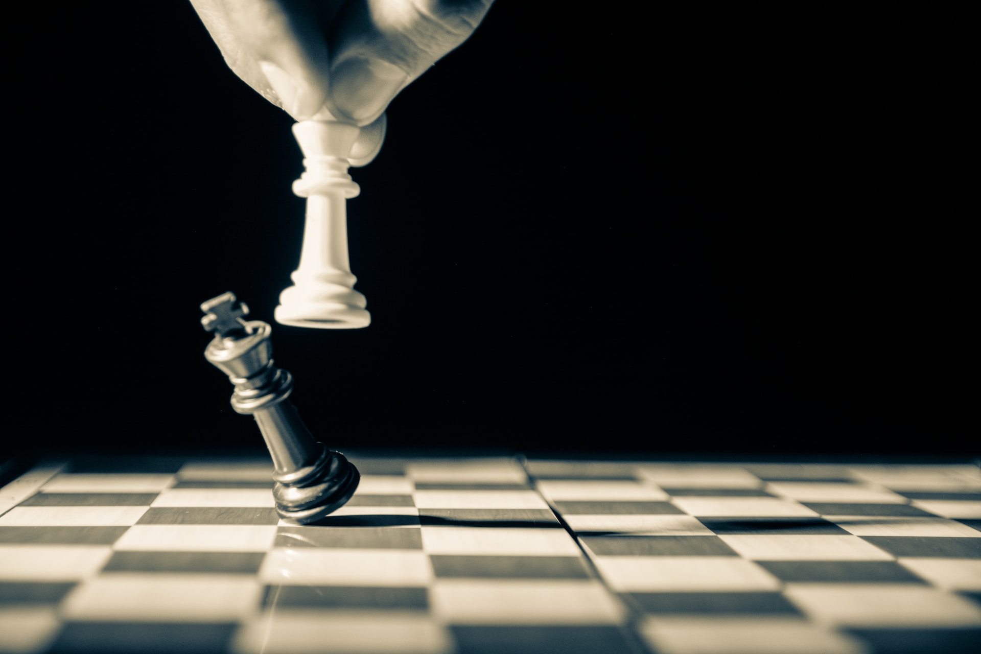 White king taking down black king on an otherwise empty chess board