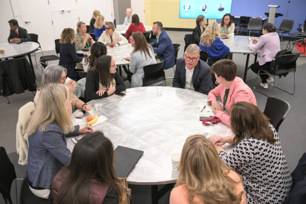 People sitting around a conference table
