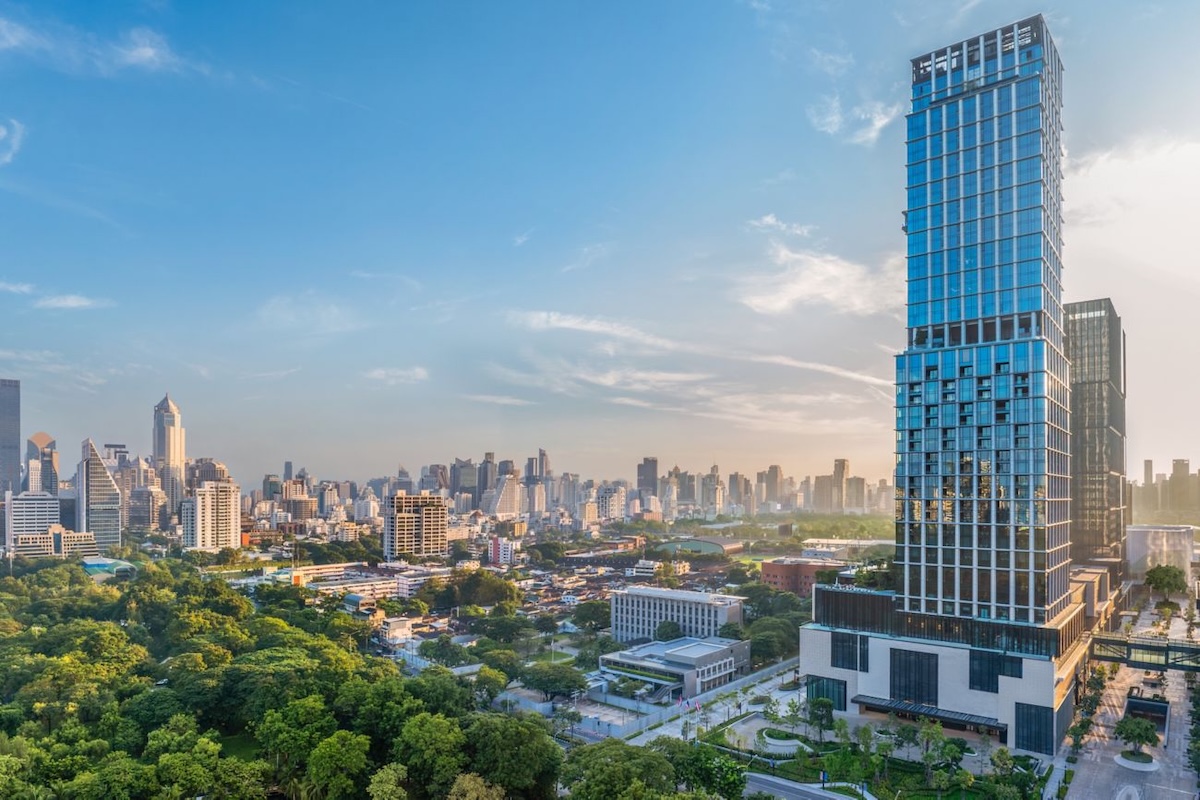 Exterior view of a city skyscraper with a cityscape in the background