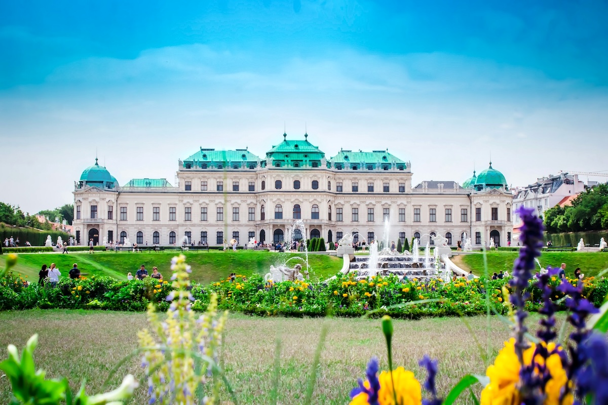 Photo of a palace and surrounding gardens