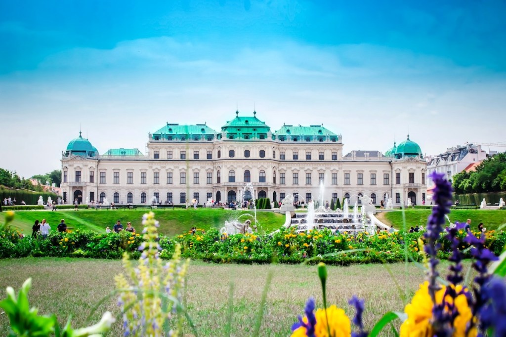 Photo of a palace and surrounding gardens