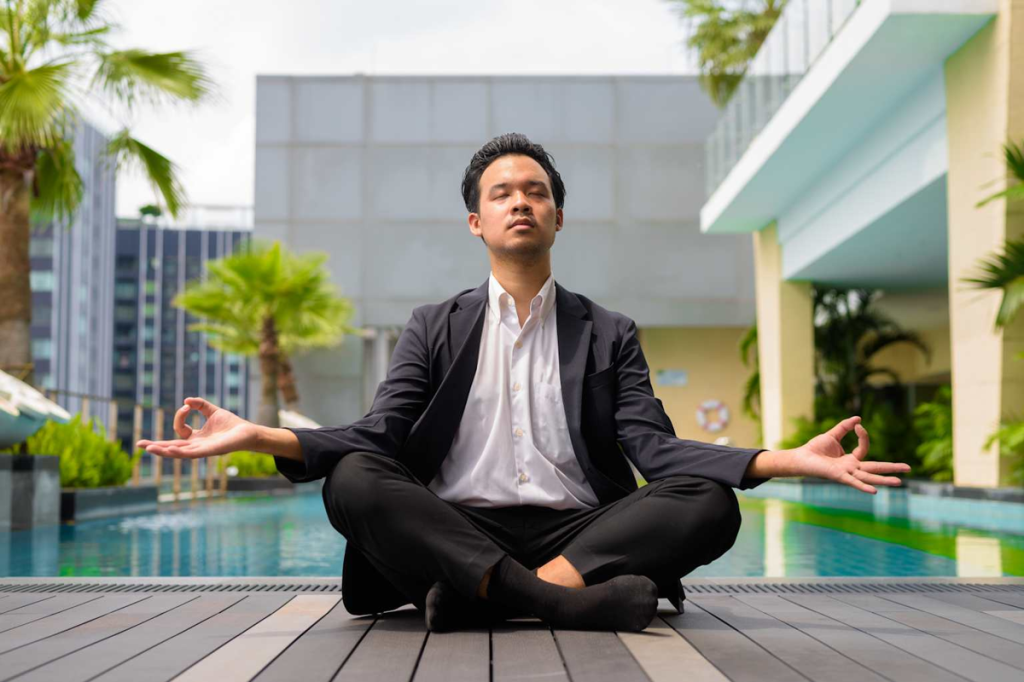 Businessperson doing yoga
